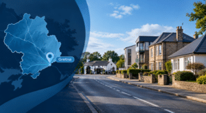 Mortgage Broker in Gretna hero image showing a Gretna street with traditional and modern homes, the historic Gretna Green Blacksmith’s Shop, and a branded location map with pin.